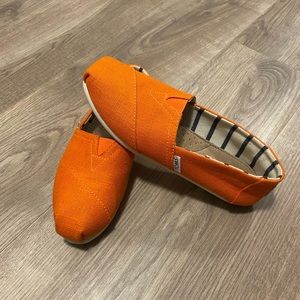 TOMS shoes in orange